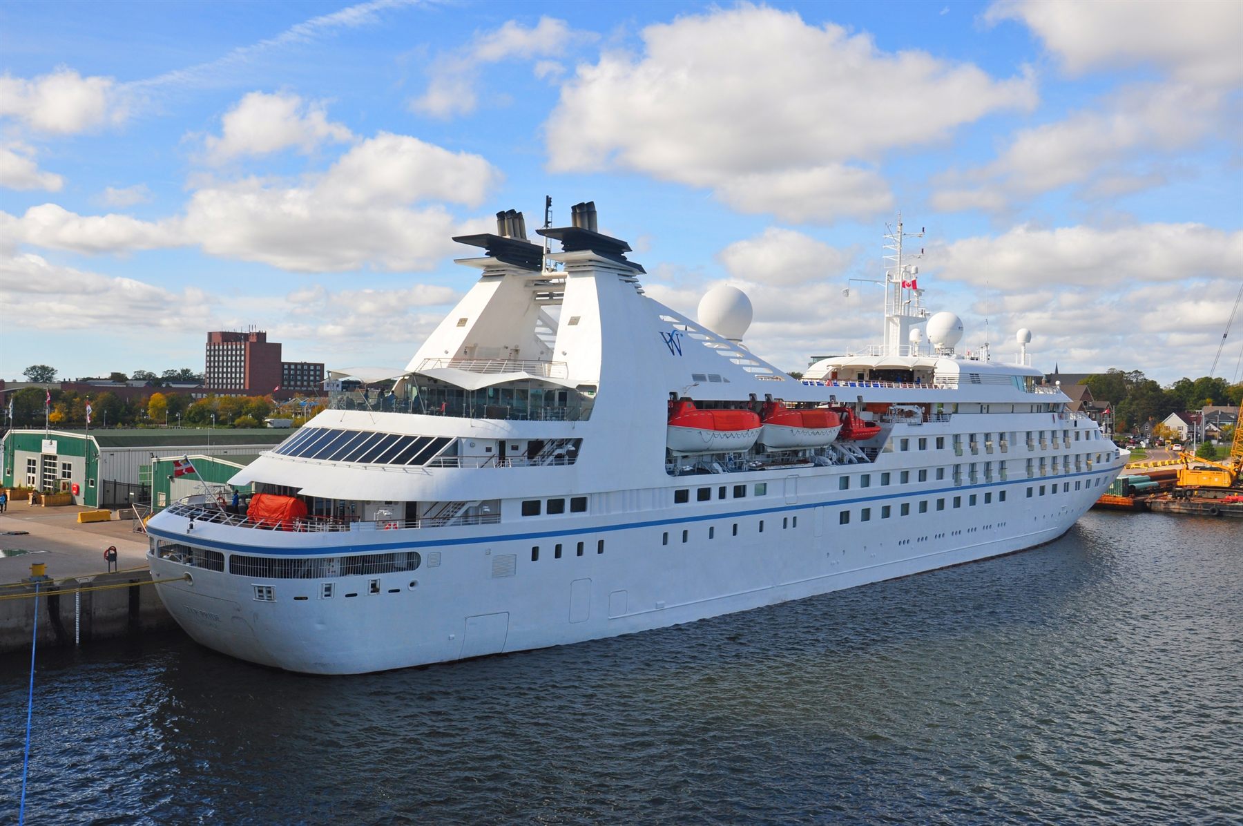 A Windstar small cruise ship docked in port
